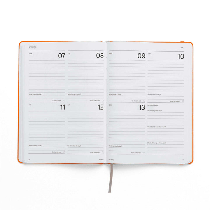 WEEKLY PLANNER 2025 - orangefarbiger  Wochenplaner - Hardcover A5 | Karst Stone Paper